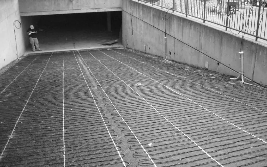 Installation de câbles chauffants pour stationnement
